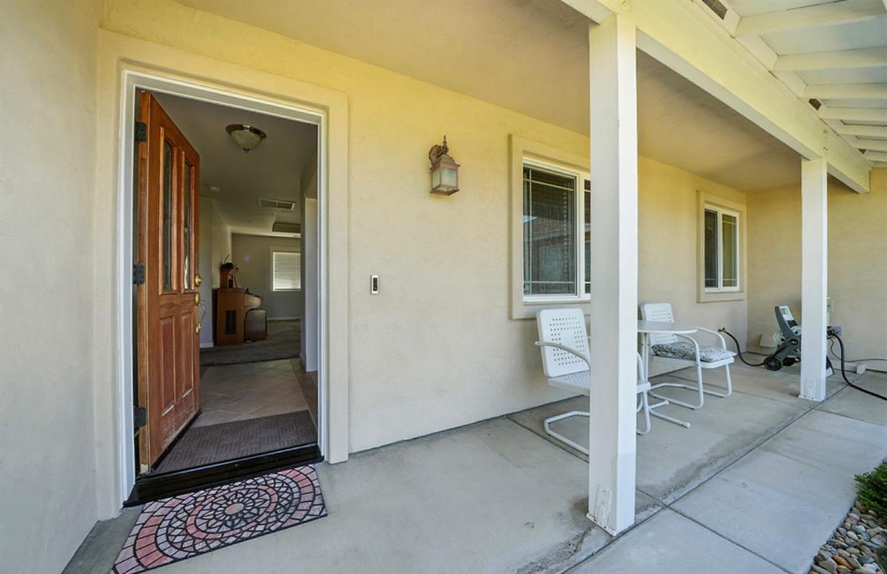 5825 Rippon Road Valley Springs, CA 95252 - Photo 5 of 45 a view of livingroom with dining area and glass door