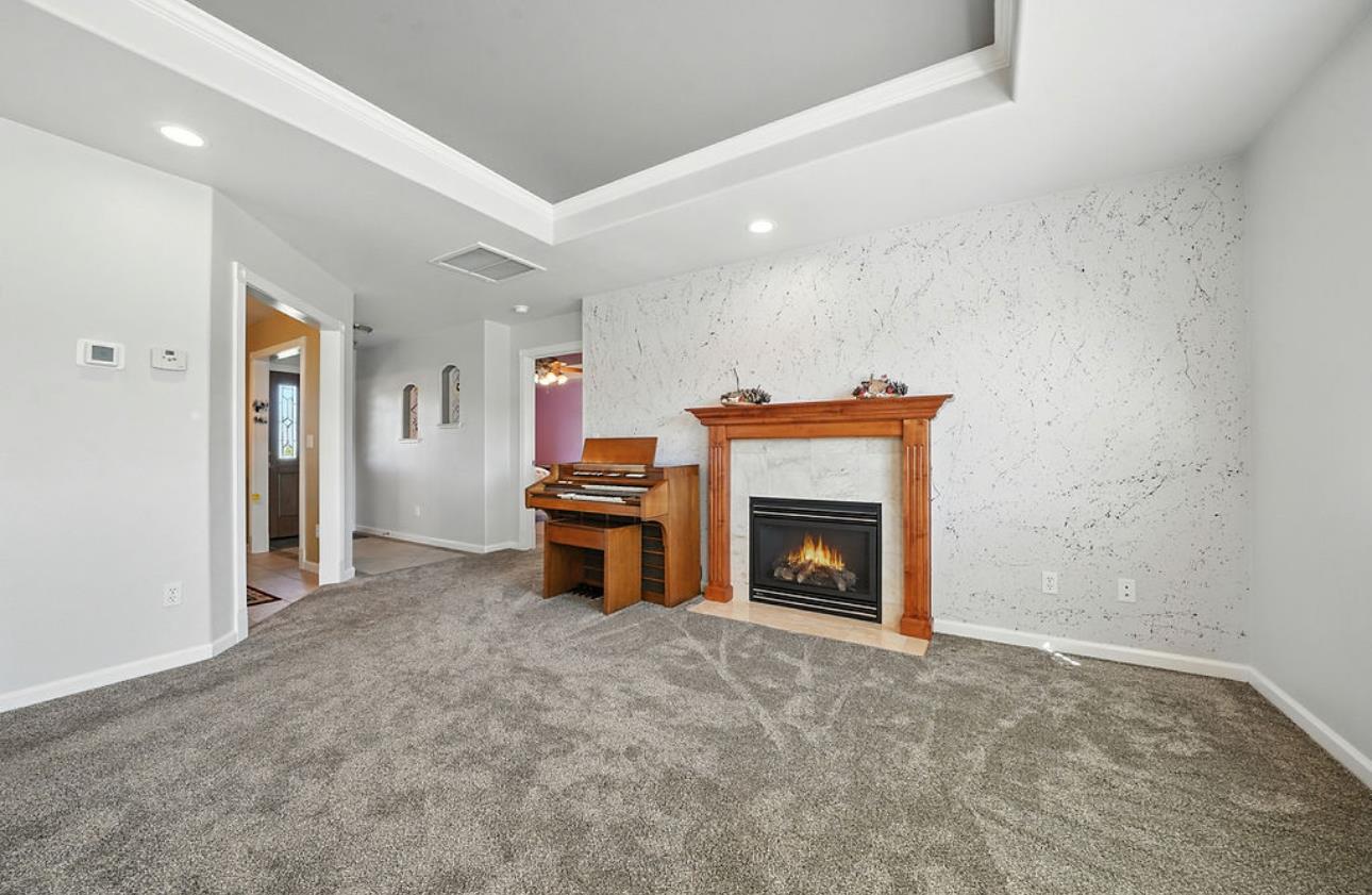 5825 Rippon Road Valley Springs, CA 95252 - Photo 9 of 45 a view of an empty room with a fireplace