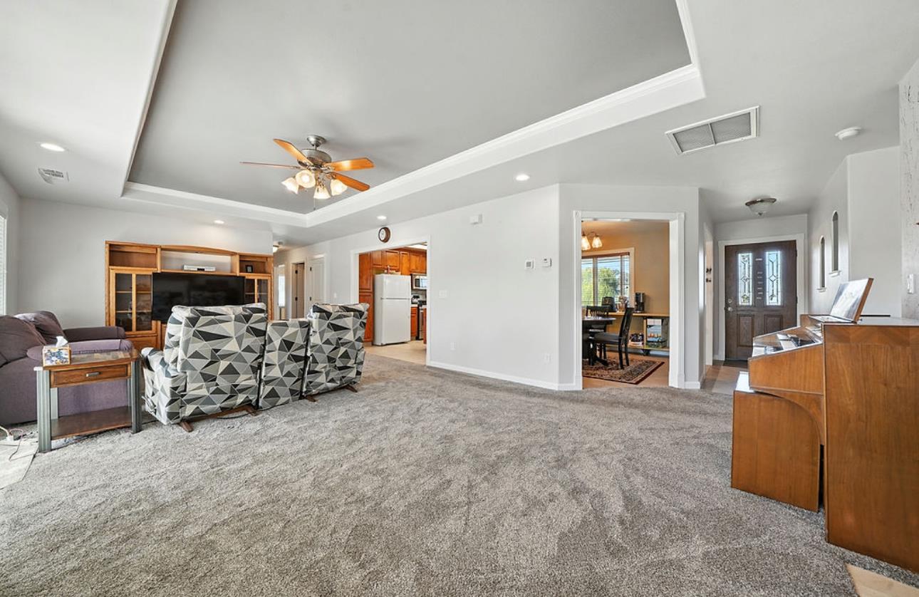 5825 Rippon Road Valley Springs, CA 95252 - Photo 10 of 45 a bed room with furniture and a chandelier