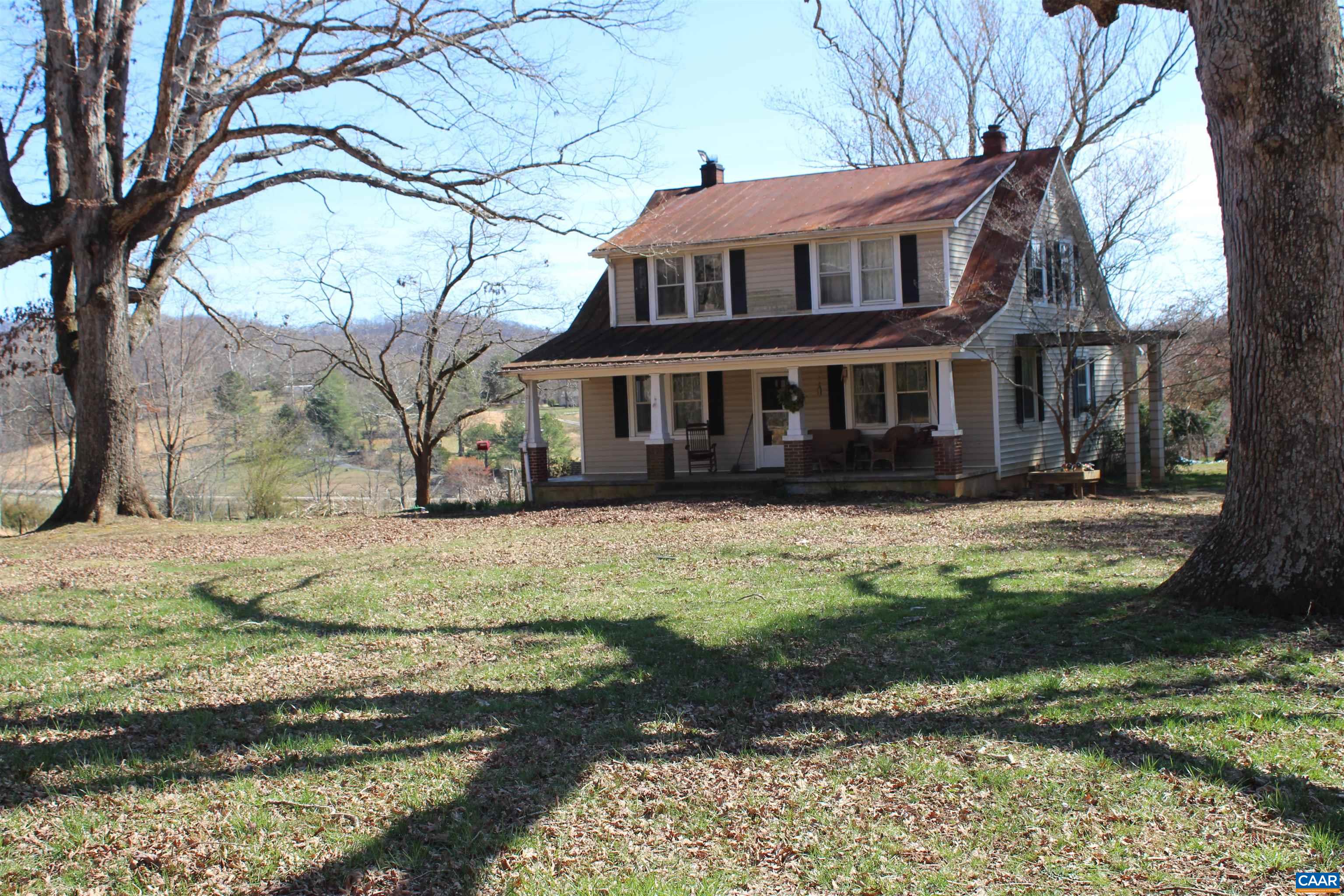 184 Flat Woods Road Amherst, VA 24521 - Photo 1 of 21 a front view of a house with a yard