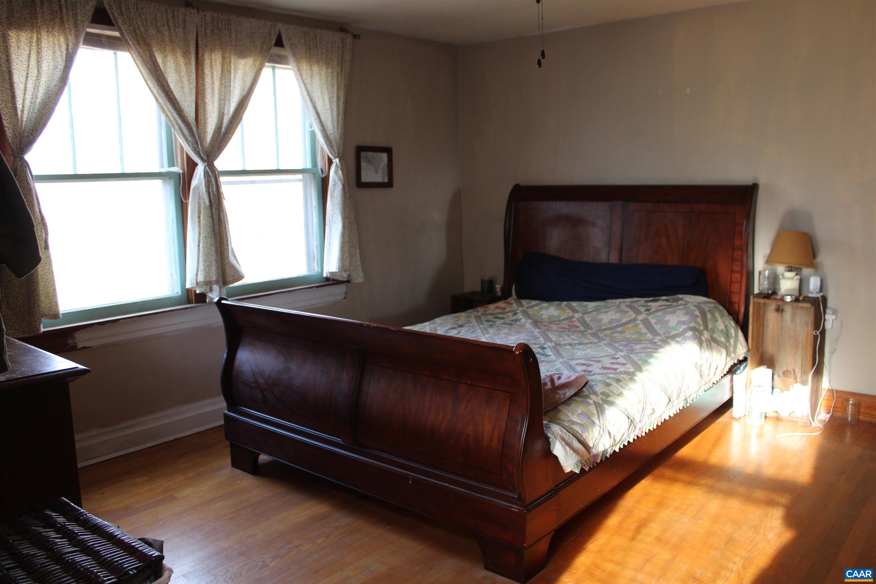 184 Flat Woods Road Amherst, VA 24521 - Photo 16 of 21 a bedroom with a bed and window