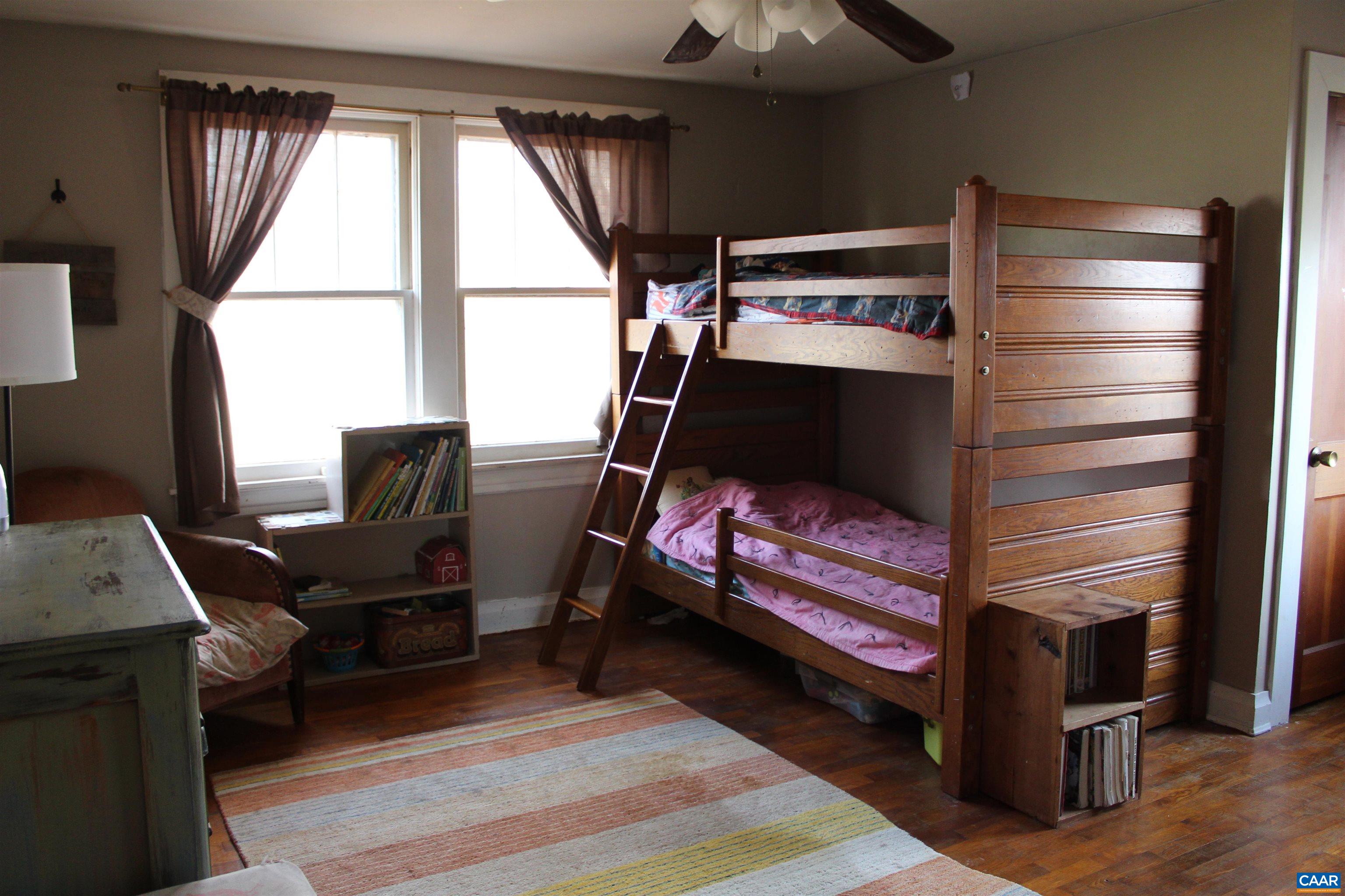 184 Flat Woods Road Amherst, VA 24521 - Photo 17 of 21 a bedroom with furniture and a window