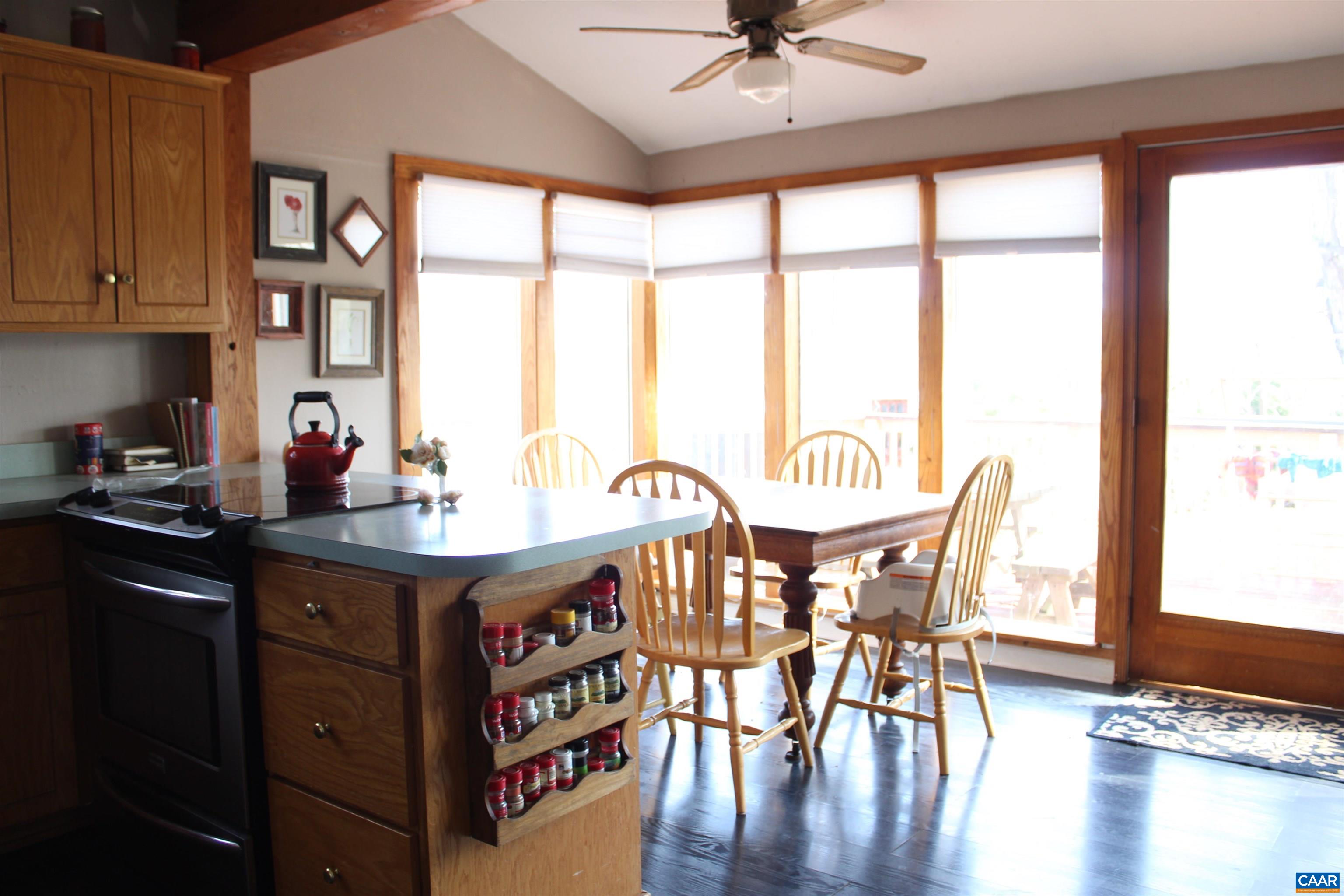 184 Flat Woods Road Amherst, VA 24521 - Photo 9 of 21 a view of a dining room with furniture window and wooden floor