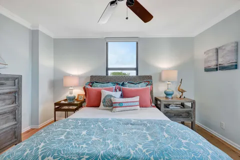 a bedroom with bed and window