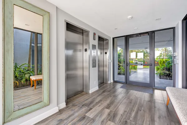 a view of entryway with wooden floor