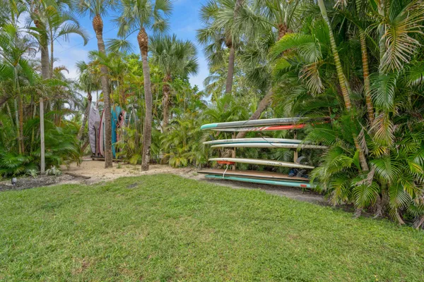 a view of outdoor space with deck and tree
