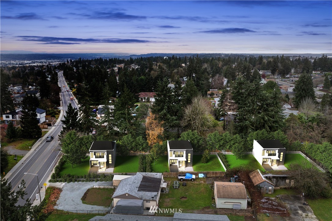 16619 Military Road South SeaTac, WA 98188 - Photo 1 of 12 a view of a patio with chairs and a table