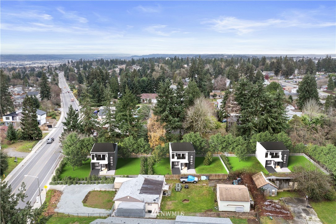 16619 Military Road South SeaTac, WA 98188 - Photo 2 of 12 a view of a patio with couches table and chairs