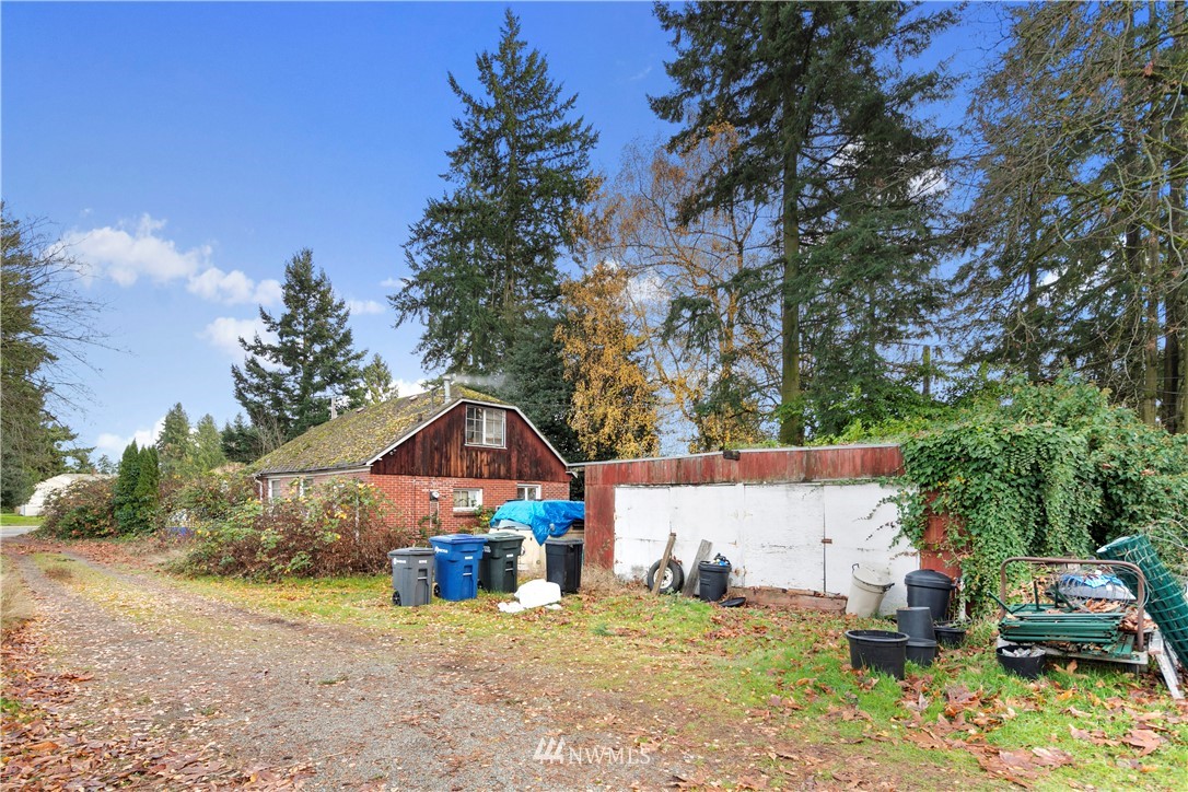 16619 Military Road South SeaTac, WA 98188 - Photo 11 of 12 a view of a house with a yard