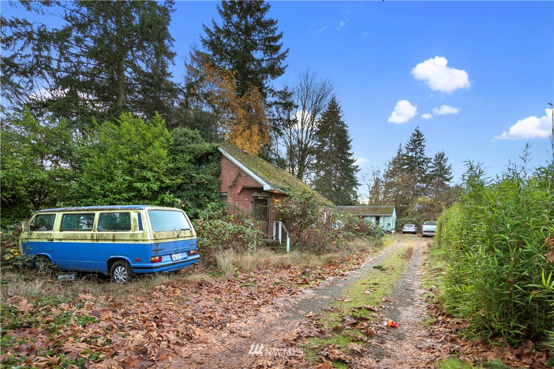 16619 Military Road South SeaTac, WA 98188 - Photo 9 of 12 a house view with a sitting space and garden view