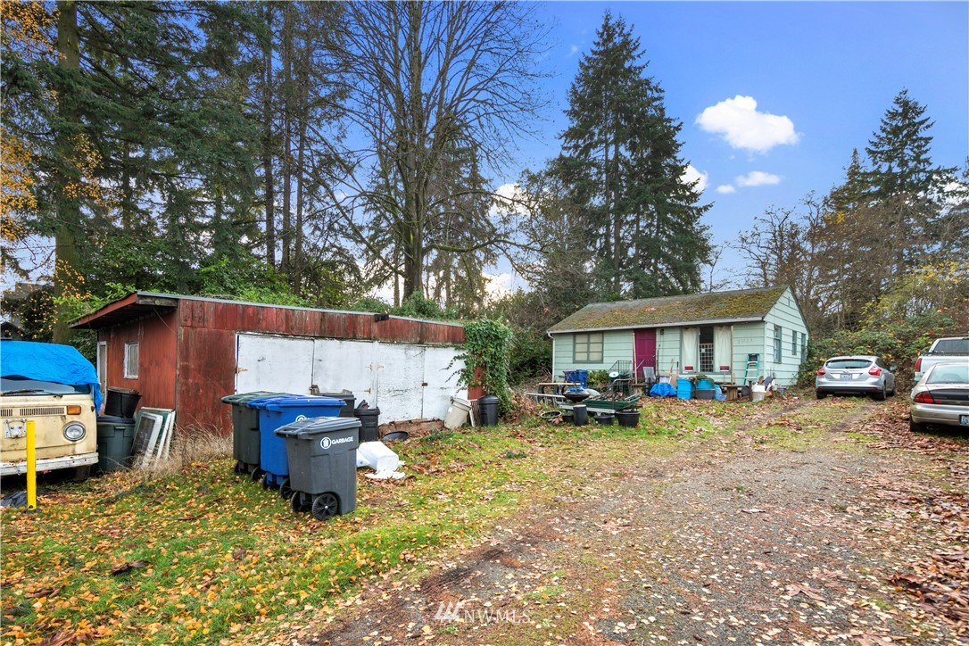 16619 Military Road South SeaTac, WA 98188 - Photo 10 of 12 a view of a house with backyard and sitting area