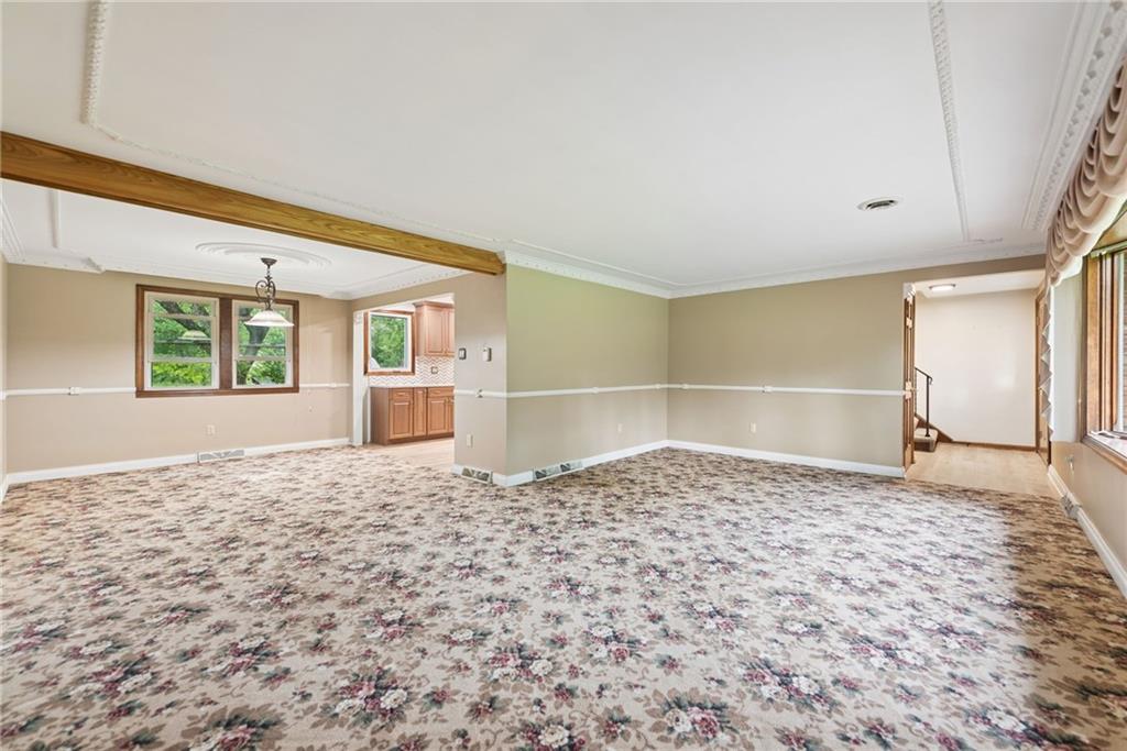 22 Buzzardtown Road Irwin, PA 15642 - Photo 16 of 44 a view of empty room with wooden floor and window
