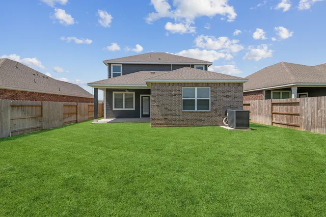 a view of a house with a garden