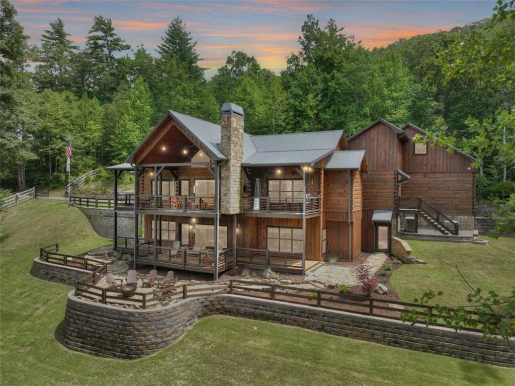 a house with river in front of it