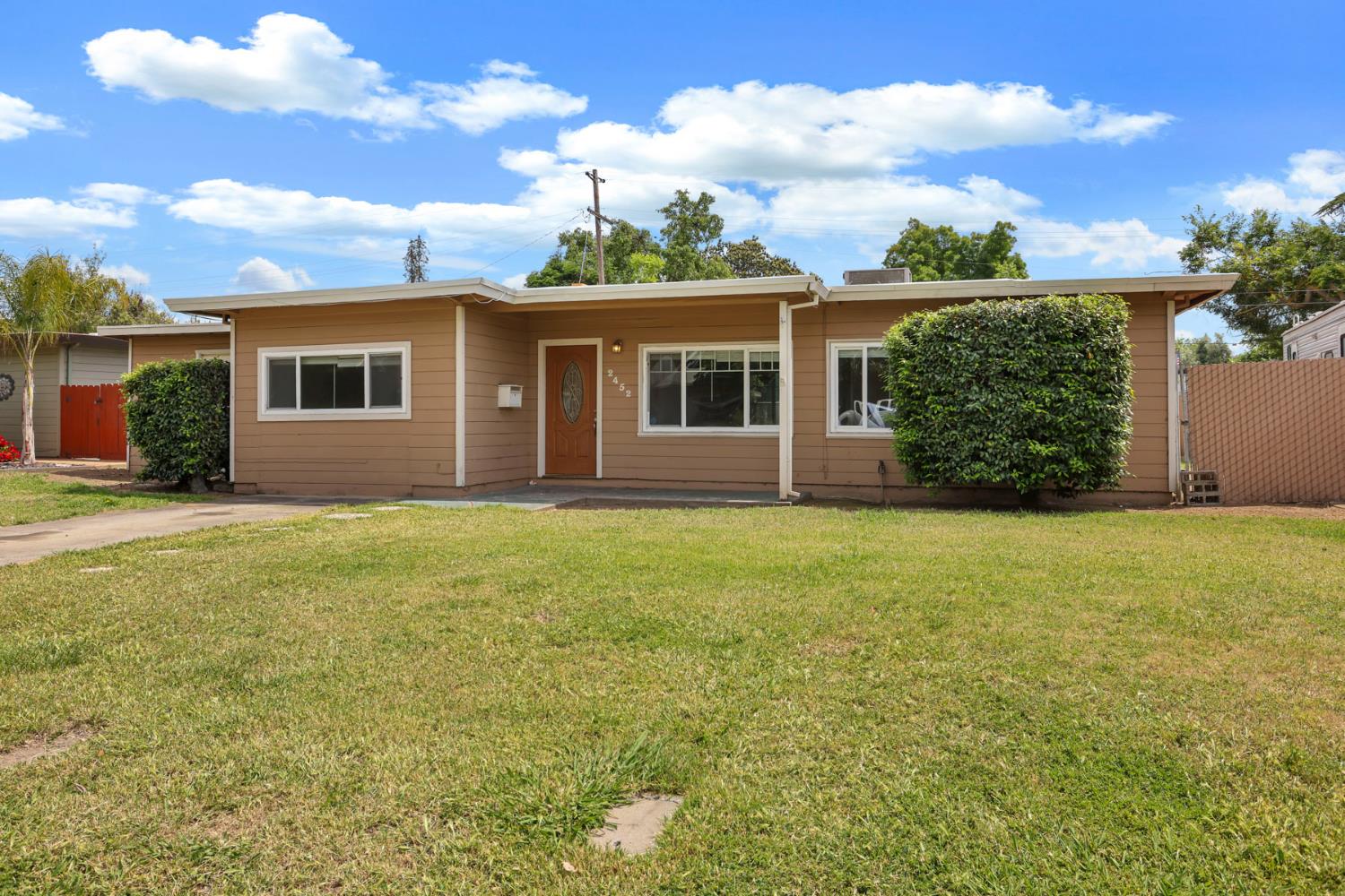2452 Christina Avenue Stockton, CA 95204 - Photo 1 of 34 front view of house with a yard