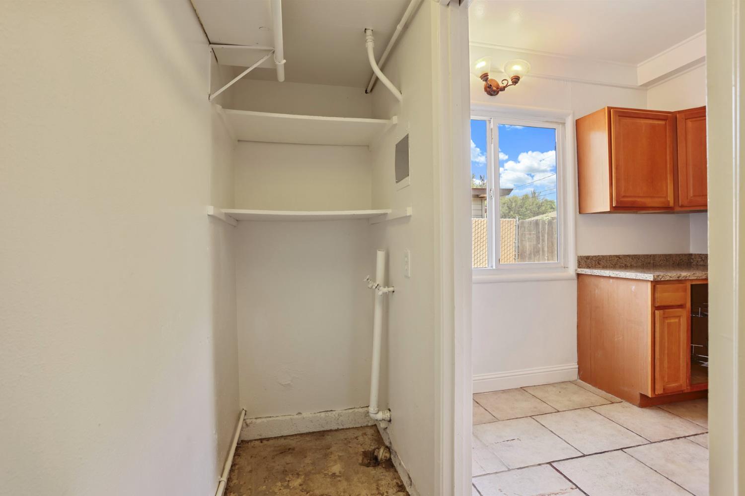 2452 Christina Avenue Stockton, CA 95204 - Photo 14 of 34 a view of kitchen and utility room