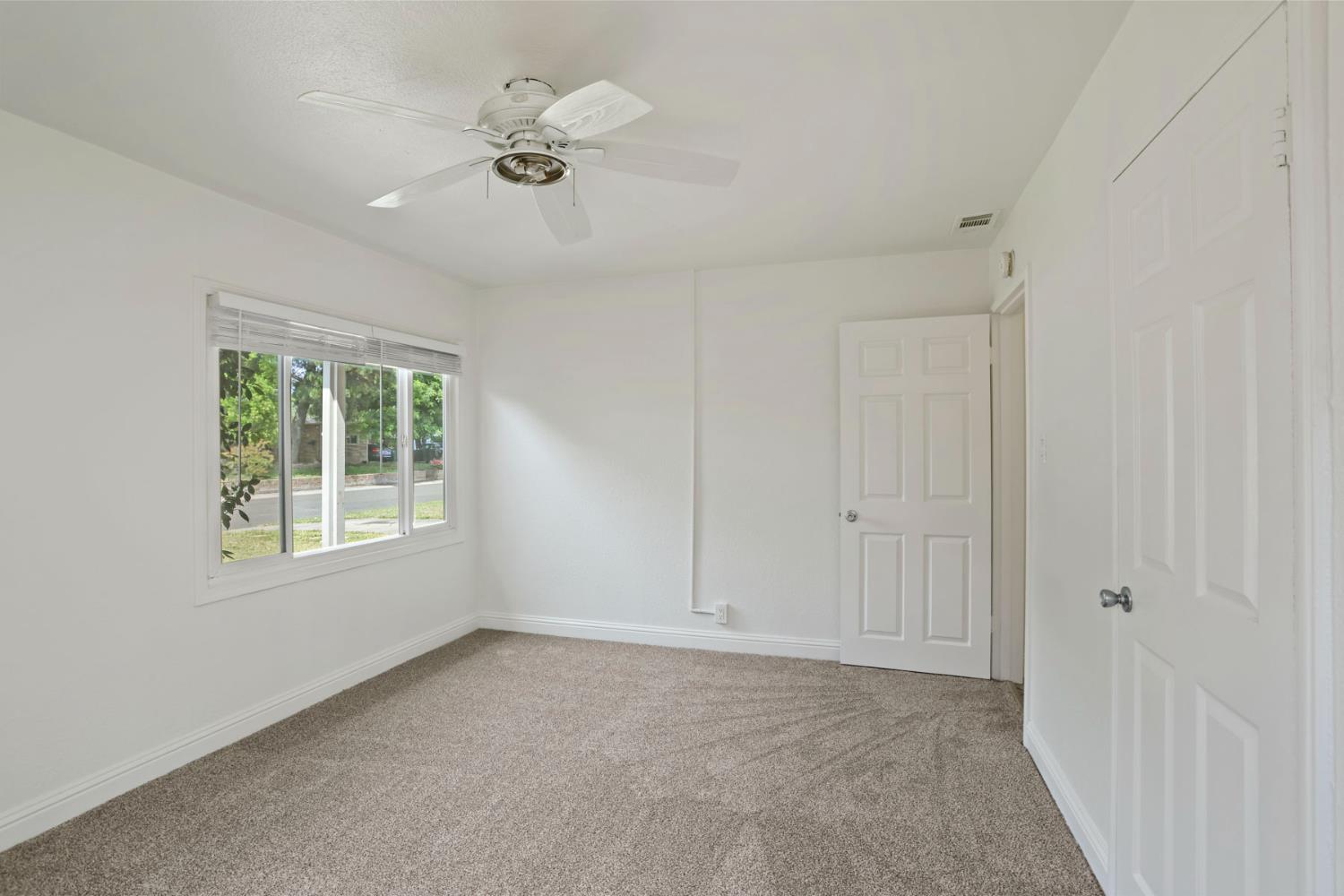 2452 Christina Avenue Stockton, CA 95204 - Photo 19 of 34 a view of an empty room with a window