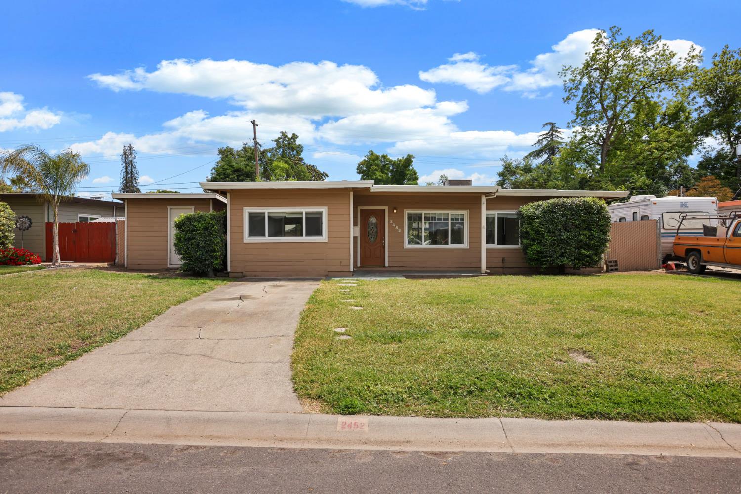2452 Christina Avenue Stockton, CA 95204 - Photo 2 of 34 front view of a house with a yard