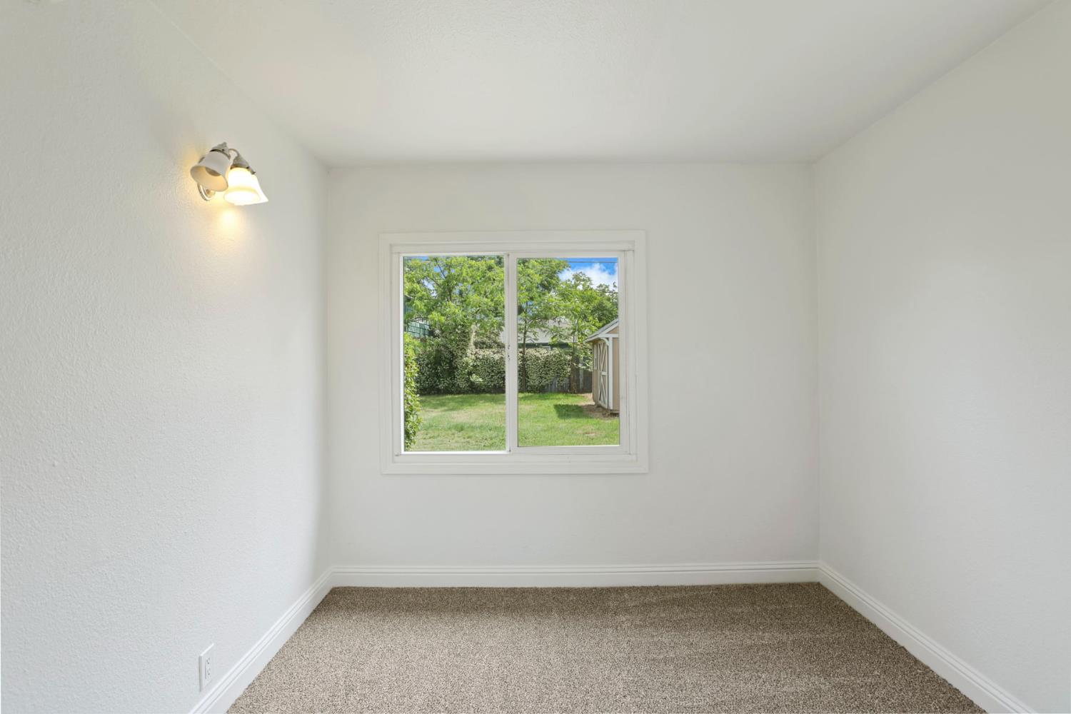 2452 Christina Avenue Stockton, CA 95204 - Photo 21 of 34 an empty room with a window