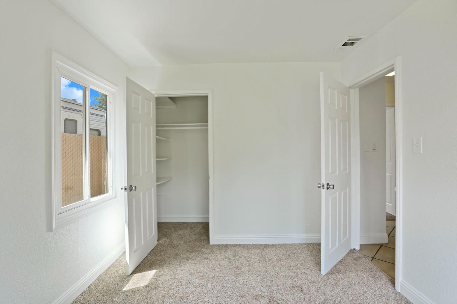 2452 Christina Avenue Stockton, CA 95204 - Photo 22 of 34 a view of an empty room with window