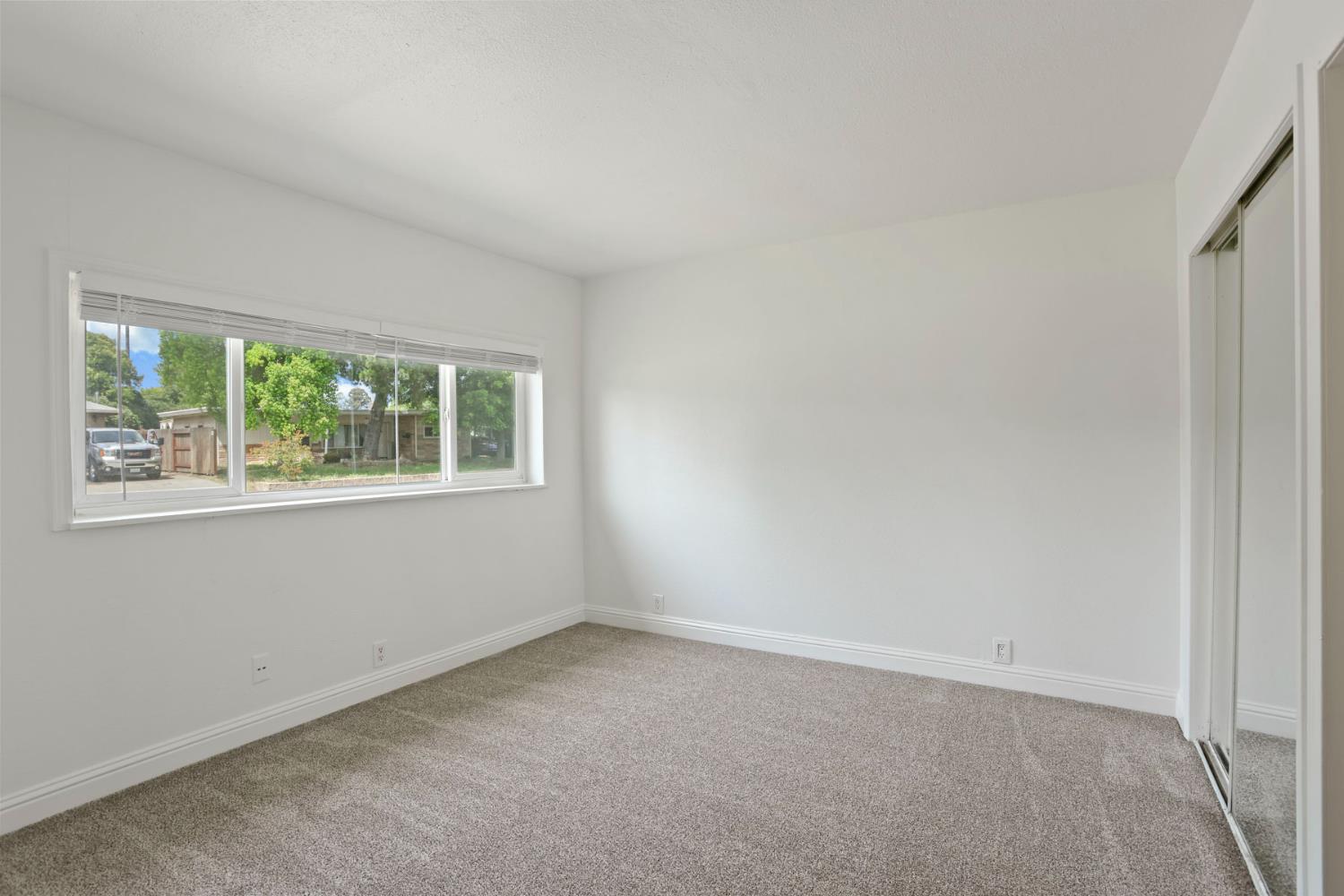 2452 Christina Avenue Stockton, CA 95204 - Photo 23 of 34 an empty room with a window