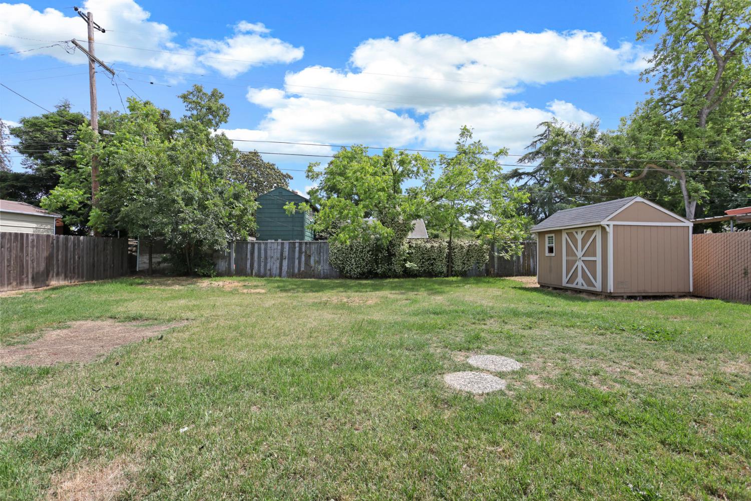 2452 Christina Avenue Stockton, CA 95204 - Photo 27 of 34 a backyard of a house with lots of green space