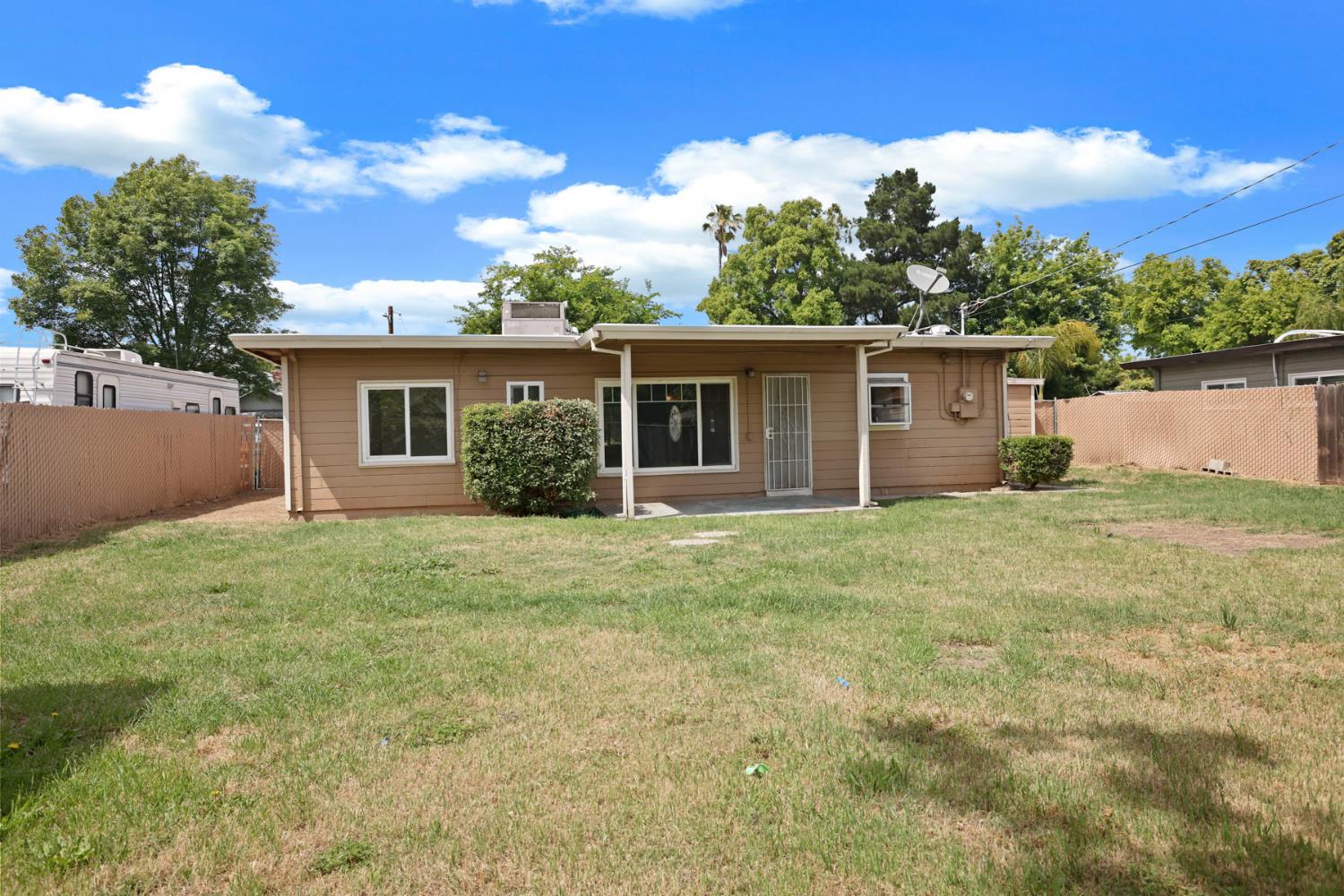 2452 Christina Avenue Stockton, CA 95204 - Photo 34 of 34 front view of a house with a yard