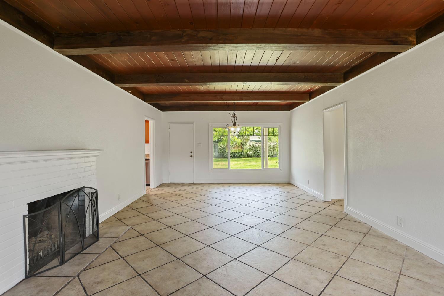 2452 Christina Avenue Stockton, CA 95204 - Photo 4 of 34 a view of entryway with a window and stairs