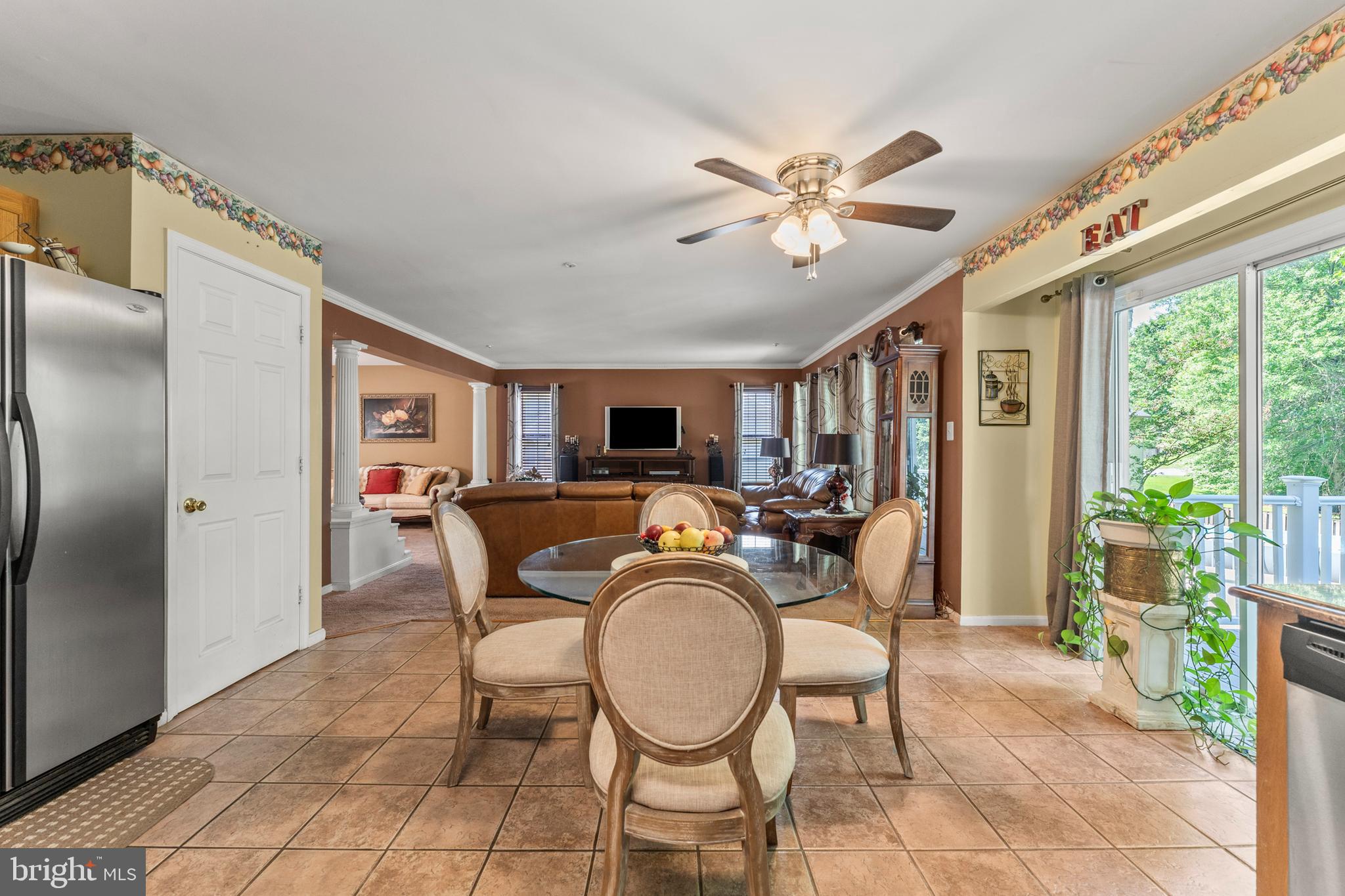 8910 Edison Lane Clinton, MD 20735 - Photo 14 of 51 a view of a dining room with furniture window and outside view