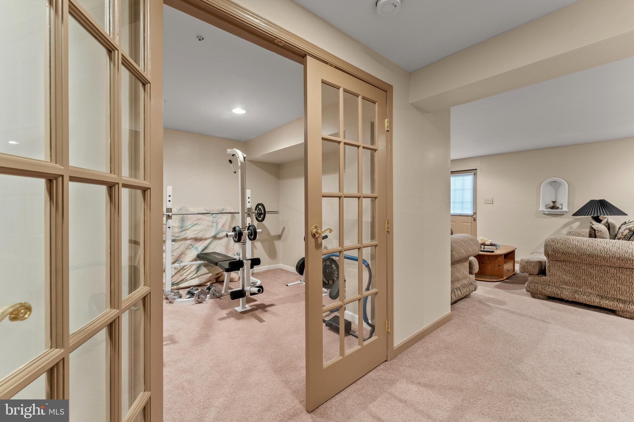 8910 Edison Lane Clinton, MD 20735 - Photo 39 of 51 a very nice looking room with many windows