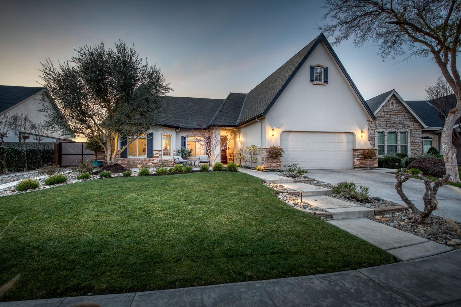 1674 North Cindy Avenue Clovis, CA 93619 - Photo 1 of 46 a view of a yard in front of house