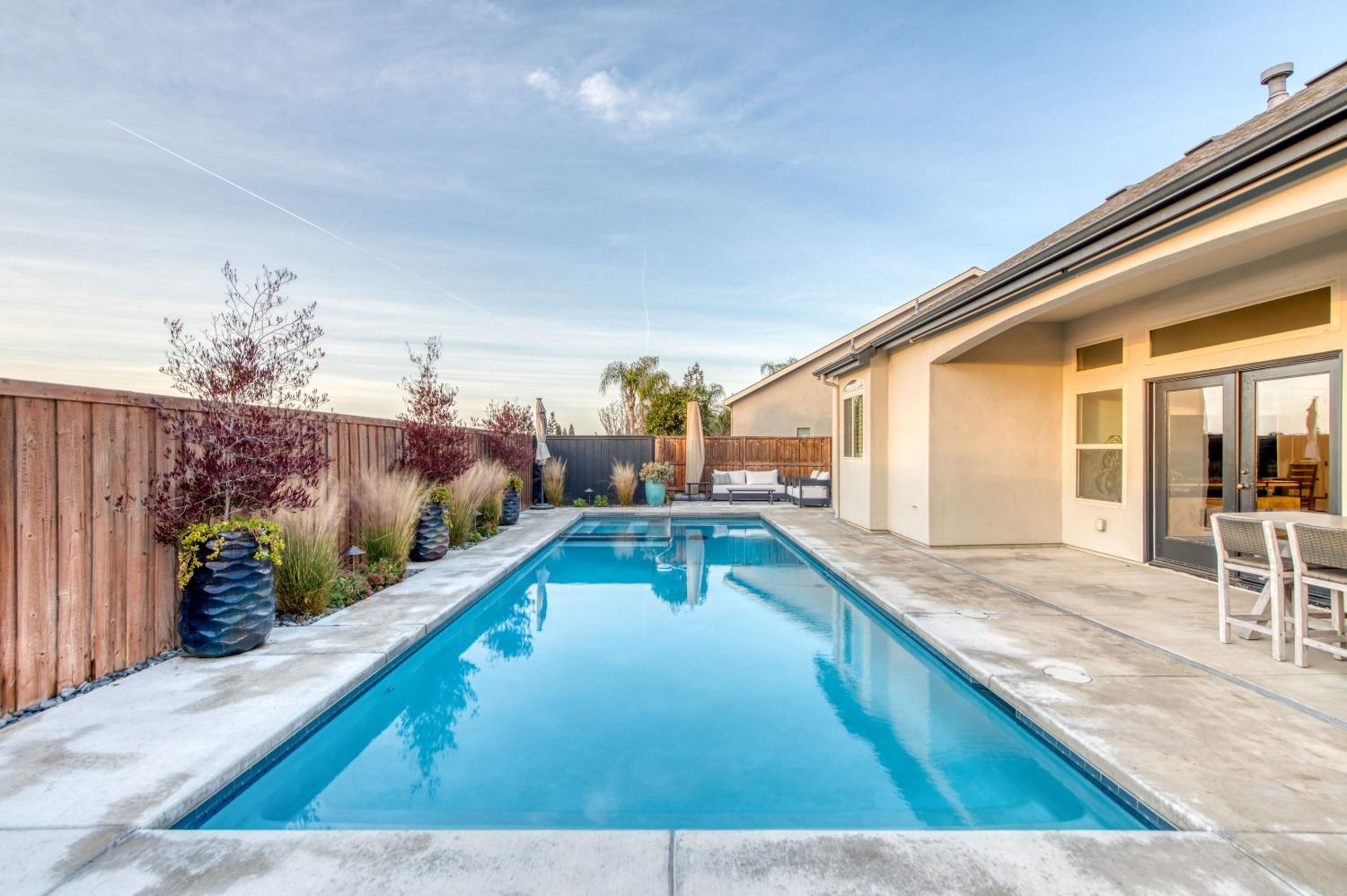 1674 North Cindy Avenue Clovis, CA 93619 - Photo 33 of 46 a swimming pool with outdoor seating