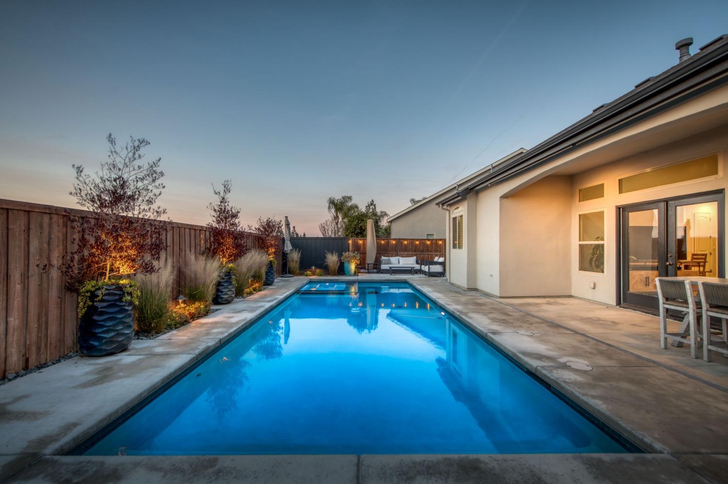 1674 North Cindy Avenue Clovis, CA 93619 - Photo 38 of 46 a swimming pool with outdoor seating