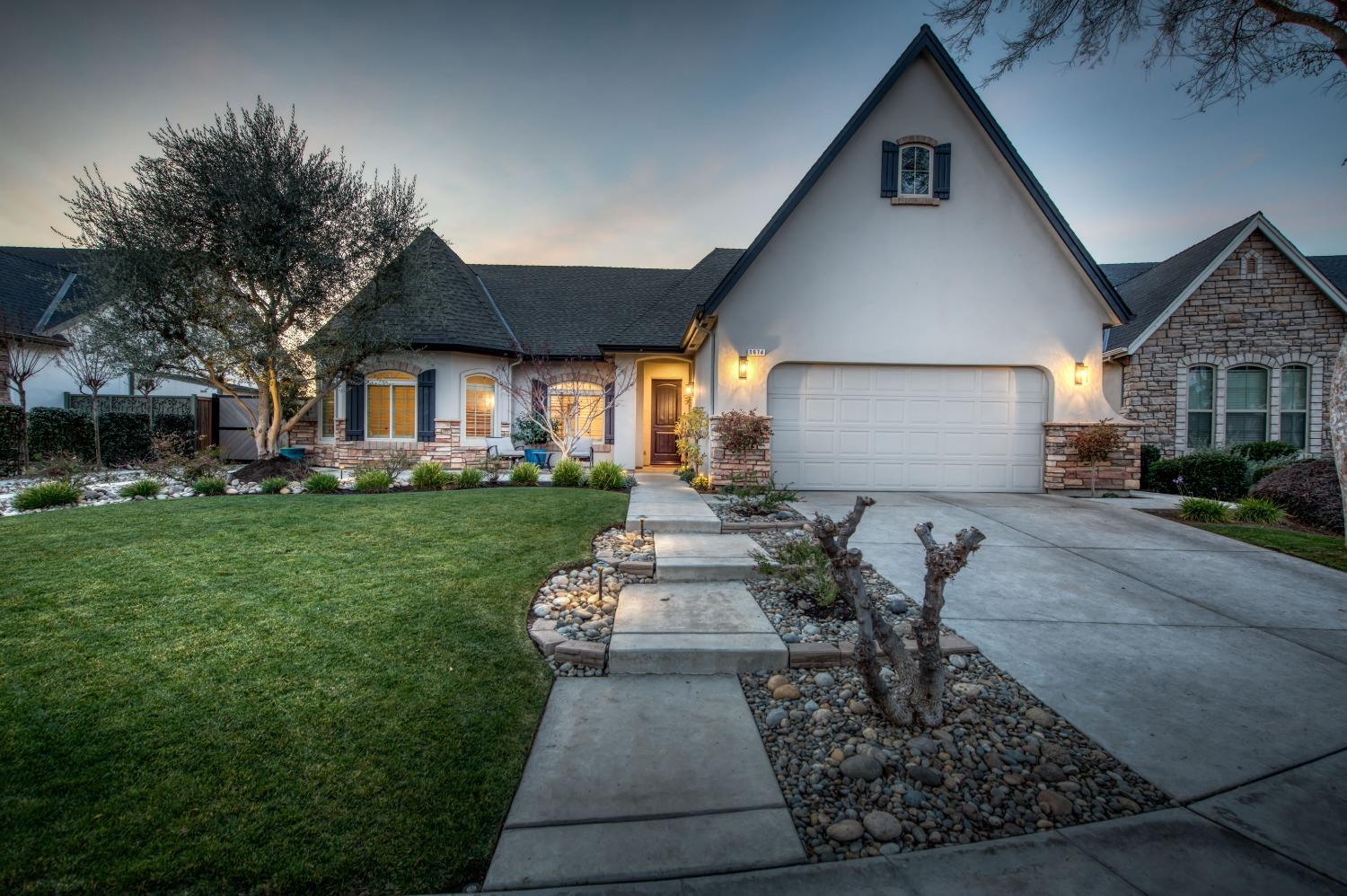1674 North Cindy Avenue Clovis, CA 93619 - Photo 46 of 46 a front view of a house with garden
