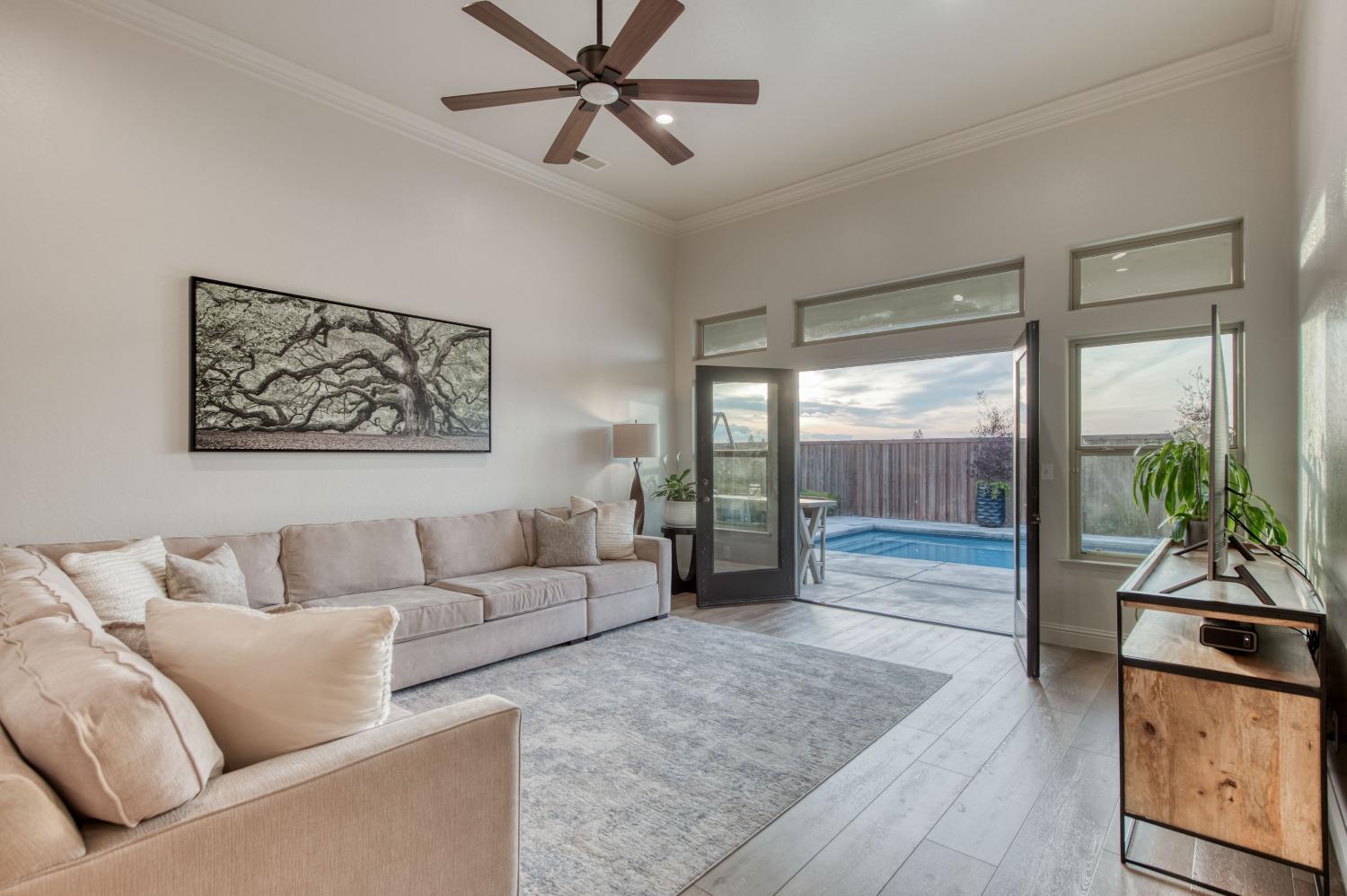 1674 North Cindy Avenue Clovis, CA 93619 - Photo 5 of 46 a living room with furniture and a large window