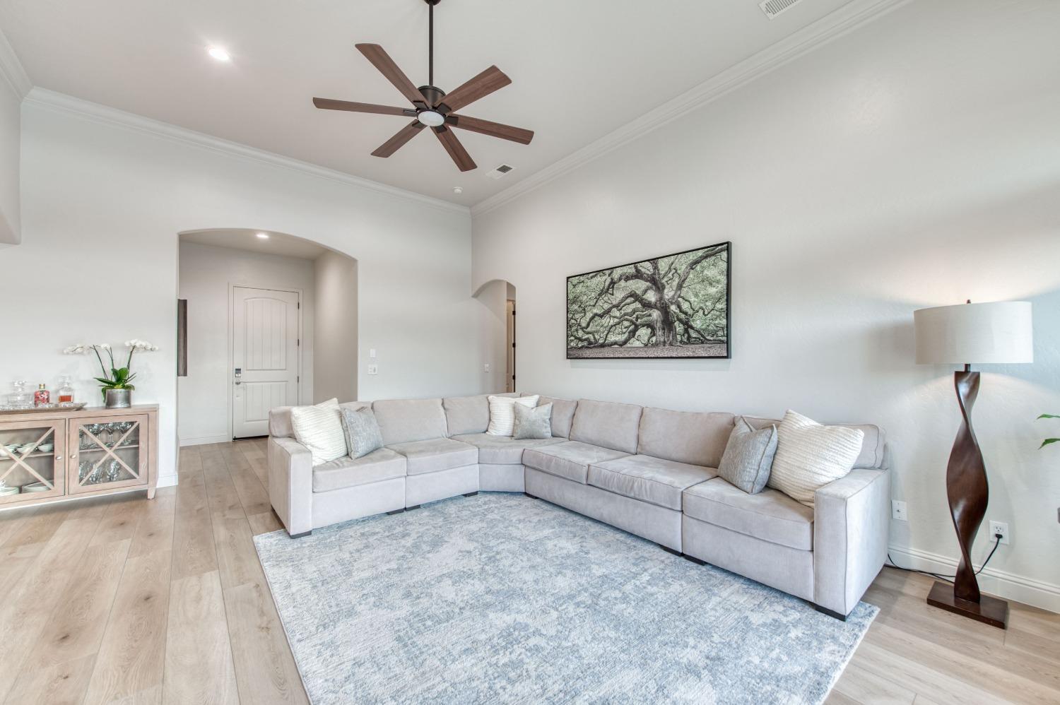 1674 North Cindy Avenue Clovis, CA 93619 - Photo 7 of 46 a living room with furniture and a wooden floor