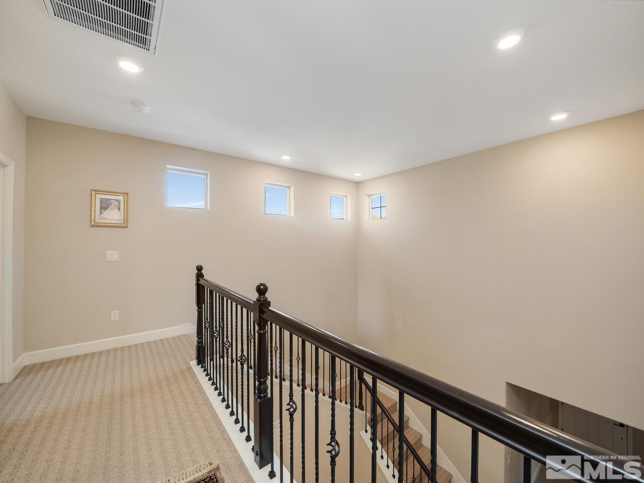 9050 Sydmesa Drive Reno, NV 89523 - Photo 11 of 23 a view of hallway with wooden floor