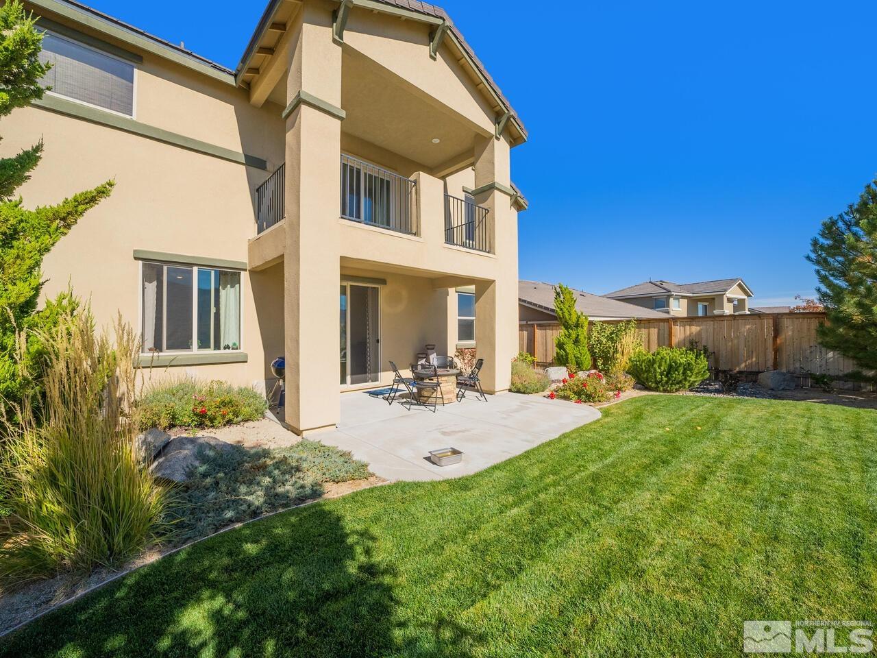 9050 Sydmesa Drive Reno, NV 89523 - Photo 21 of 23 a view of a house with backyard and sitting area