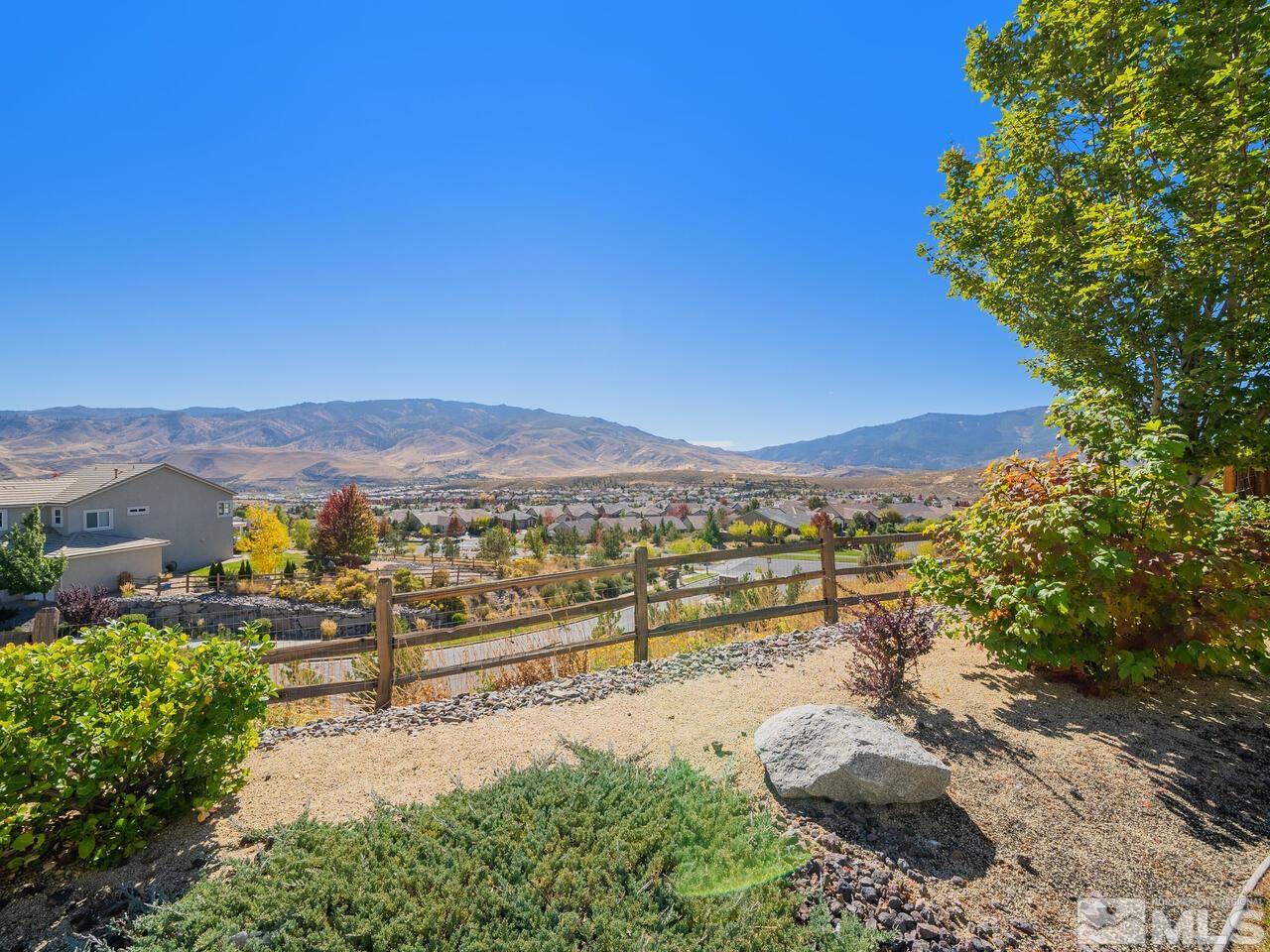9050 Sydmesa Drive Reno, NV 89523 - Photo 3 of 23 a view of a city with tall buildings