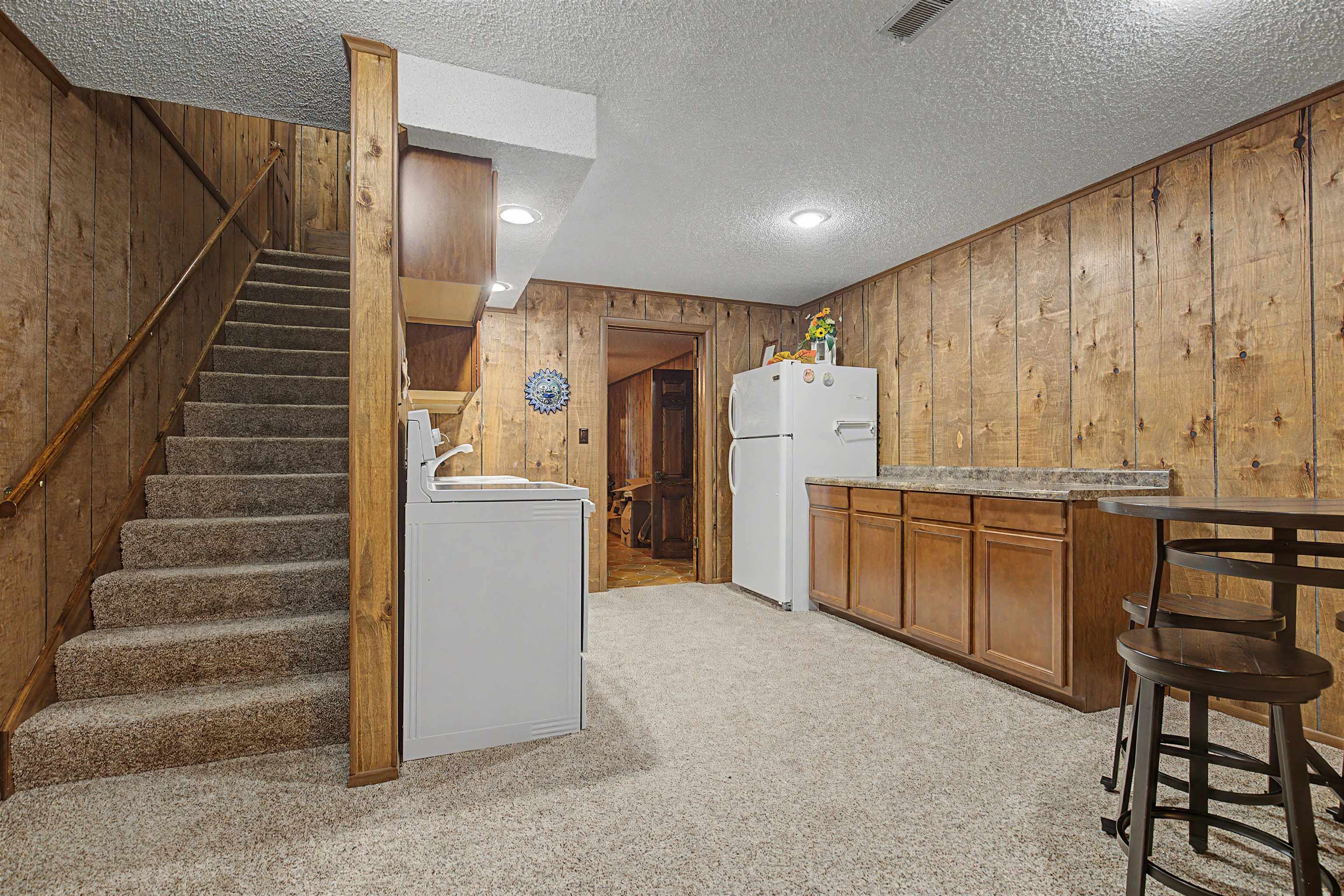 17380 Corbett Road Mount Carroll, IL 61053 - Photo 23 of 65 a view of kitchen with furniture and refrigerator