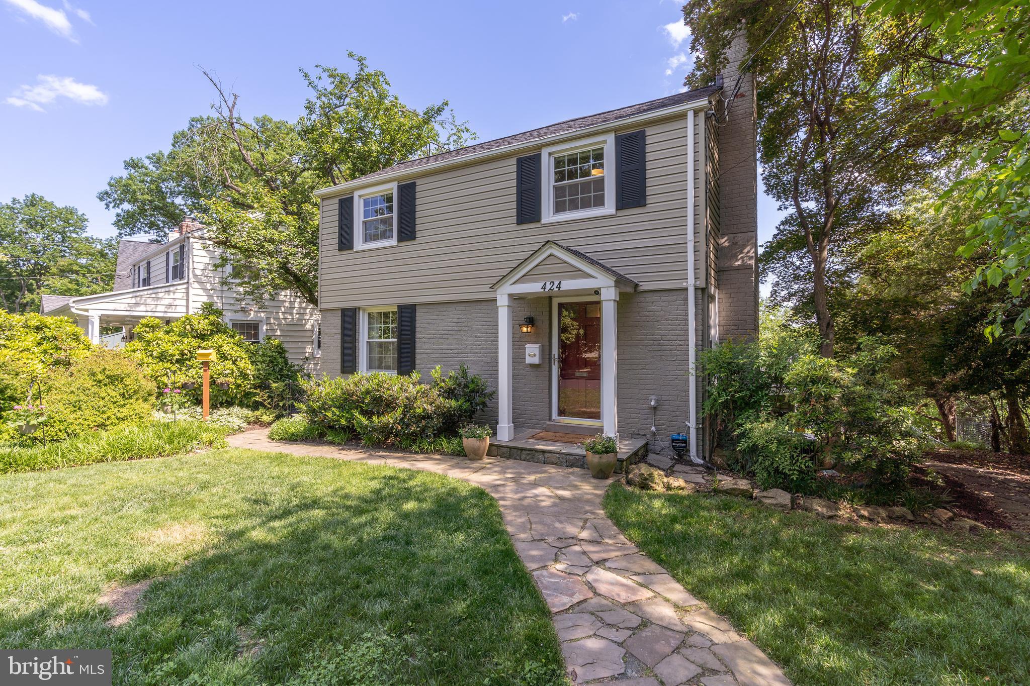 424 Whitestone Road Silver Spring, MD 20901 - Photo 2 of 42 Walkway leads you to the covered front steps