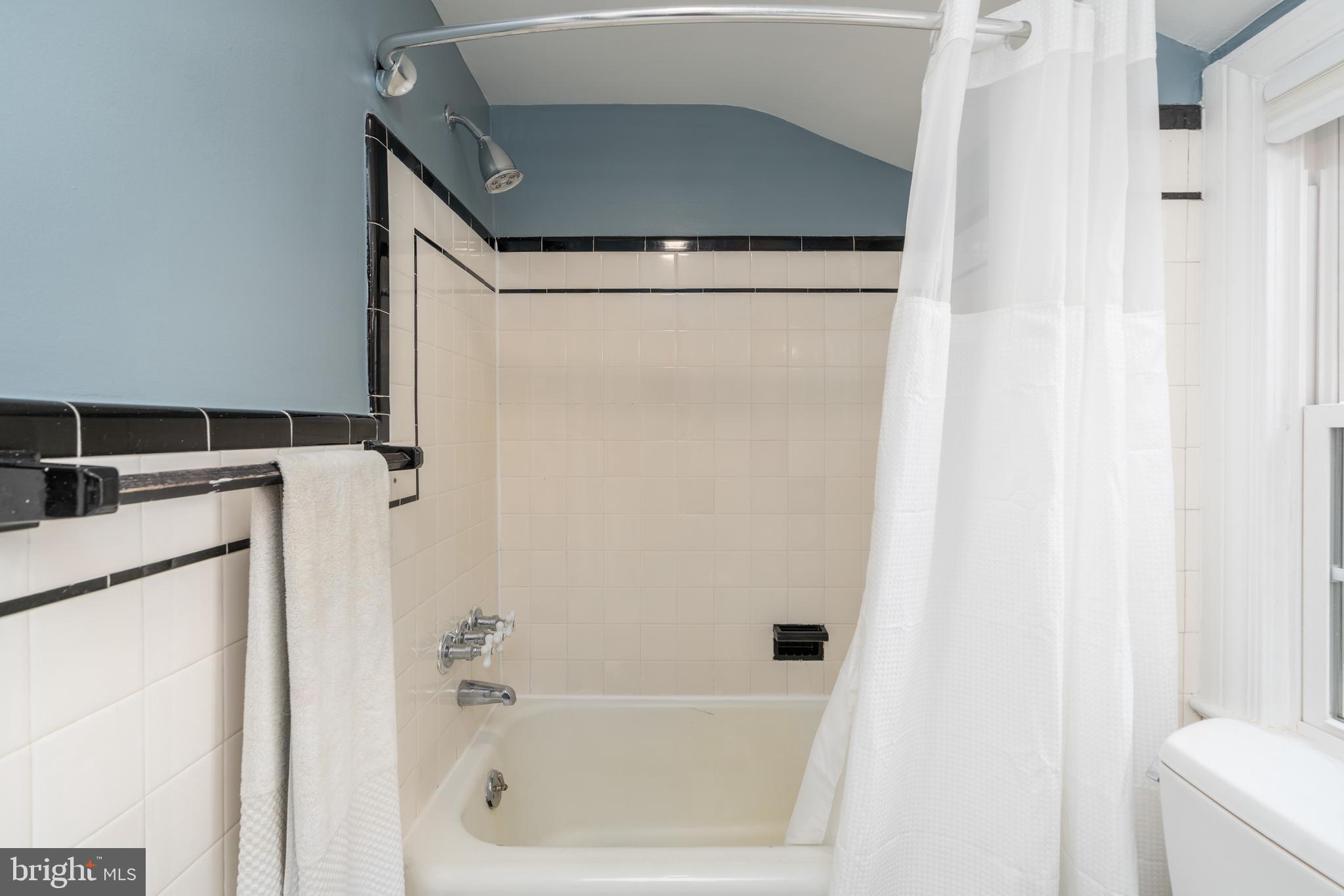 424 Whitestone Road Silver Spring, MD 20901 - Photo 26 of 42 Additional storage with built in cupboard in bath