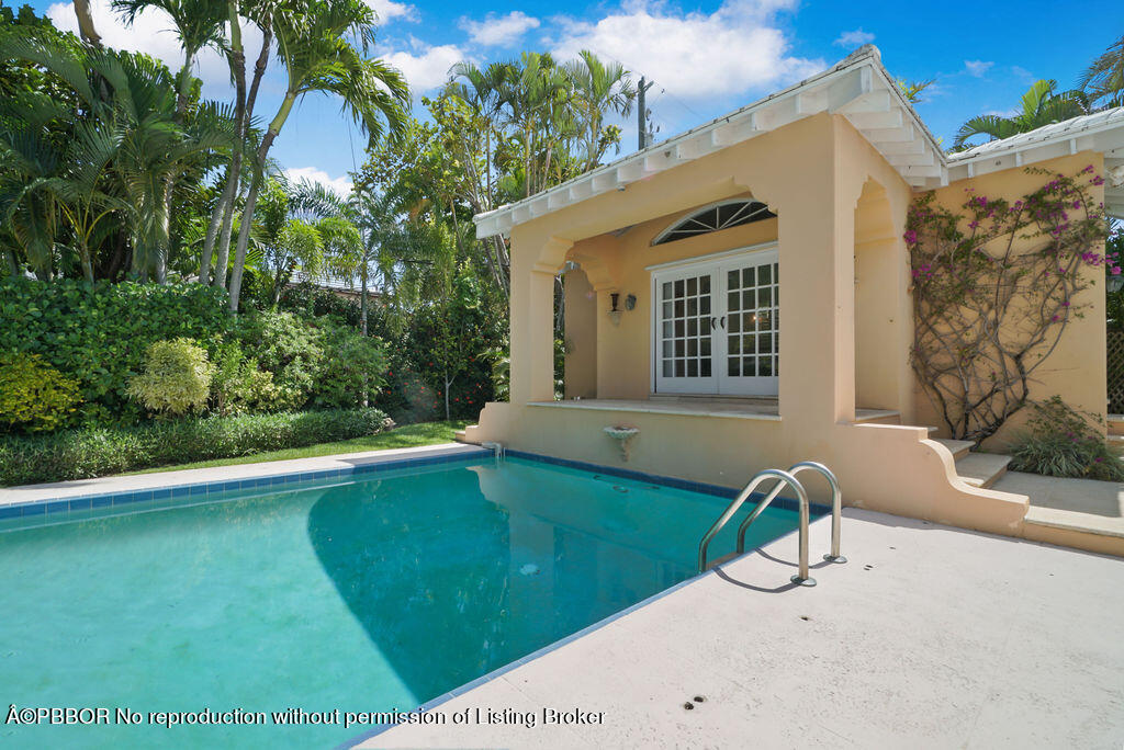 257 Fairview Road Palm Beach, FL 33480 - Photo 20 of 30 a view of a house with backyard