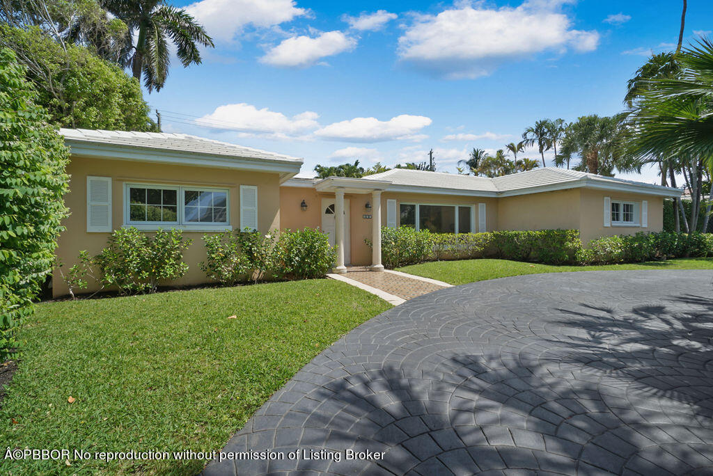 257 Fairview Road Palm Beach, FL 33480 - Photo 28 of 30 a view of outdoor space yard and front view of a house