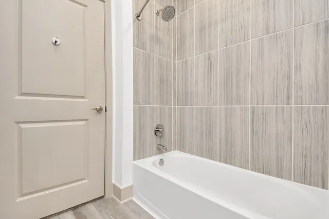 a bathroom with a white bath tub