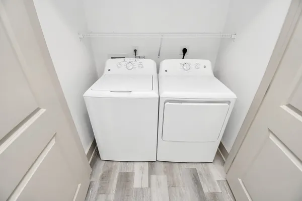 a utility room with dryer and washer