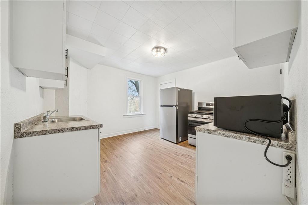 3226-3228 Richardson Avenue Pittsburgh, PA 15212 - Photo 6 of 30 Kitchen has all new appliances included.