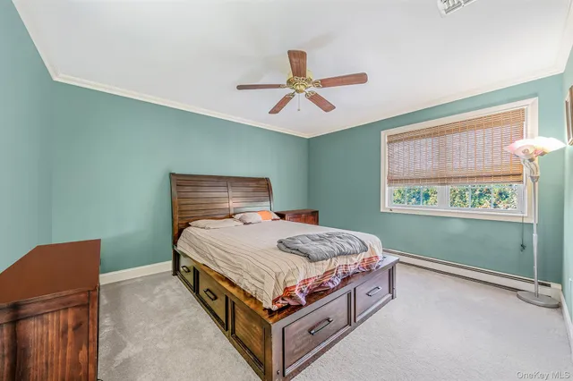 a bed room with a bed and a window