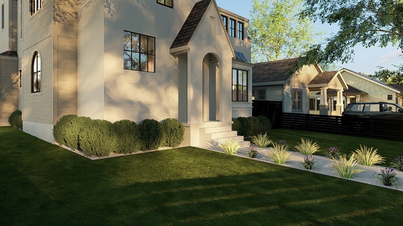 1711 Singleton Avenue Austin, TX 78702 - Photo 3 of 18 a front view of a house with a garden and a yard