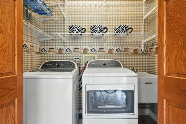 a utility room with dryer and washer